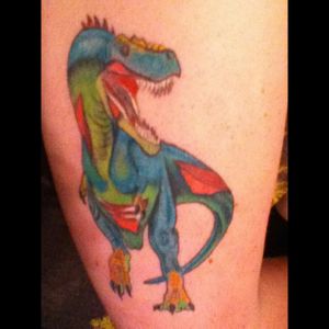 Fifth tattoo. 18 years old.It was suppose to be a zombie t-rex, but the lady screwed it up. :/#tyrannosaurus