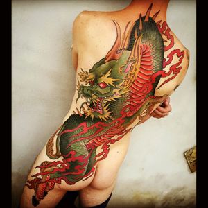 Interesting green & red Asian Dragon full back tattoo