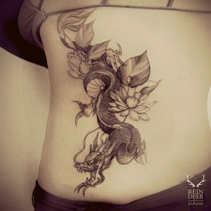 Cool black & grey Dragon, lotus & leaves tattoo