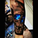 Sick dark skull with illuminated blue eye sockets tattoo #dreamtattoo #mydreamtatoo