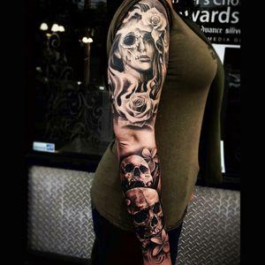 Sick black & grey zombie portrait with roses & skulls sleeve tattoo#dreamtattoo #mydreamtatoo