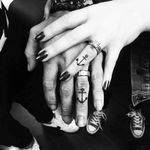 Awesome couple anchor ring finger tattoos