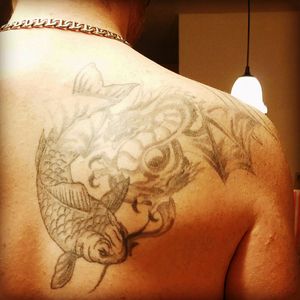 The Koi was added in '10 to complete Yin and Yan also aligning with the fable of a Koi.