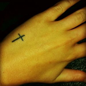 It's the smallest but my favorite ❤ #cross #hand #handtattoo #cute
