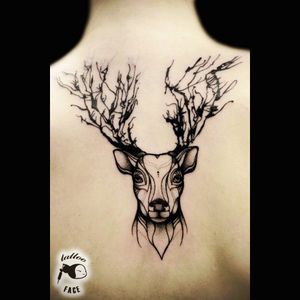 Beautifully done deer tattoo