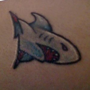 This one is my first tattoo . I went and got this little banger on Friday the 13th mostly out of impulse . Never regret it . Done at top shelf tattoo forgot the artist though.#shark #FridayThe13th