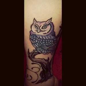 Owl on left calf, it represents strength and protection over my children.
