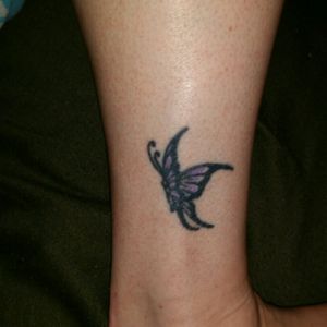 My first tattoo right ankle.  Had this done 2 weeks after I turned 18, (18 yrs ago) the butterfly to me symbolizes the freedom of becoming an adult and spreading my wings.
