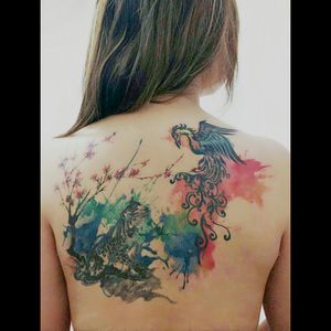 Snow leopard with phoenix in watercolor and Chinese ink style #snowleopard #phoenix #chinesestyle #watercolor #tattoo #upperback #upperbacktat #TattooGirl #PhoenixTattoos #leopardtattoo #hongkong