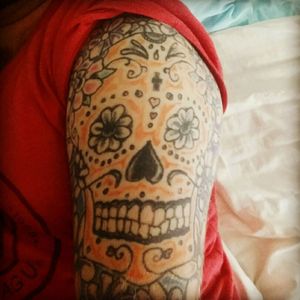 Sugar Skull I got a few years ago.  Needs some serious touch up but love my ink