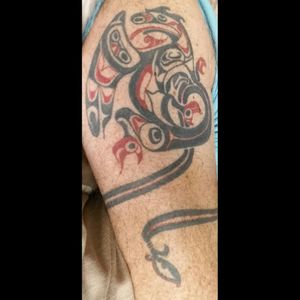 This was my first tattoo...a Haida piece to symbolise my Canadian roots and my Celtic heritage. There are a few issues with it, and want to get those bits corrected at one stage but it's fairly good none-the-less!