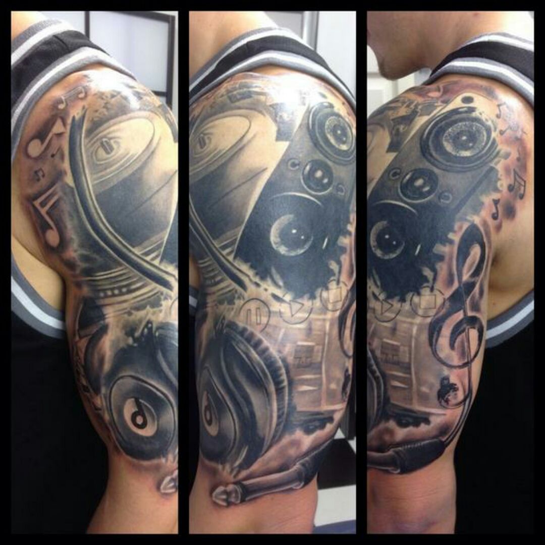 Grey Ink Skull Chain Sprocket Tattoo