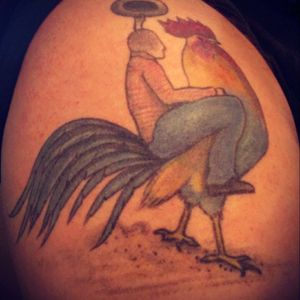 My elderly uncle has always given me a bad time about my skinny legs. He would ask "Are those your legs or are you riding a chicken?". So I had this tattoo done a few years ago.