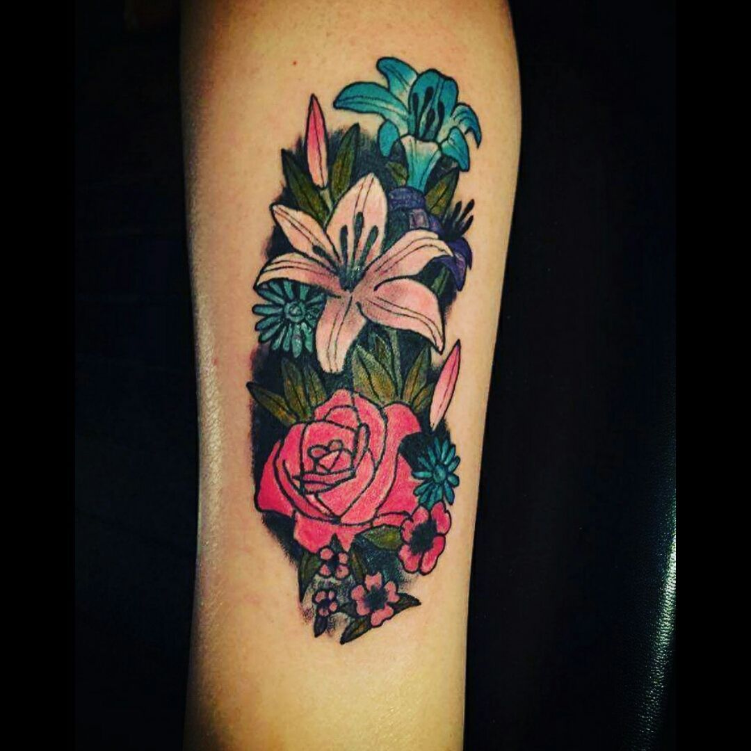 Lily  Rose tattoo located on the inner arm sketch
