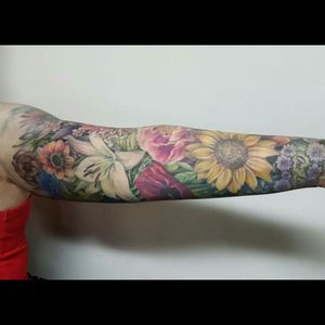Wicked colorful realistic lily, daisy, rose and flowers sleeve tattoo #dreamtattoo #mydreamtattoo