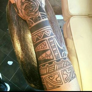 Some of my ink. Polynesian with a rose on my hand.