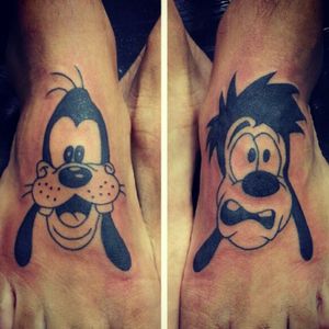 My tattoos feet, tribute to my father in childhood form. #tattoo #goofy #fatheransson