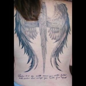 My back tattoo.. The first tattoo I had done by Floyd at Redeeming Tattoos. Sat for 12 hours the first time. The bible verse is in my Mother's handwriting. She has emphysema and I wanted to always have something of hers with me.