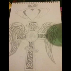I want this for I loving memory of my grandad but would like the ribbons at the top of the Crown and at the bottom of the cross but with some room to and my nan in when she is gone too #dreamtattoo