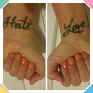 #love on my right wrist and #hate on my left wrist