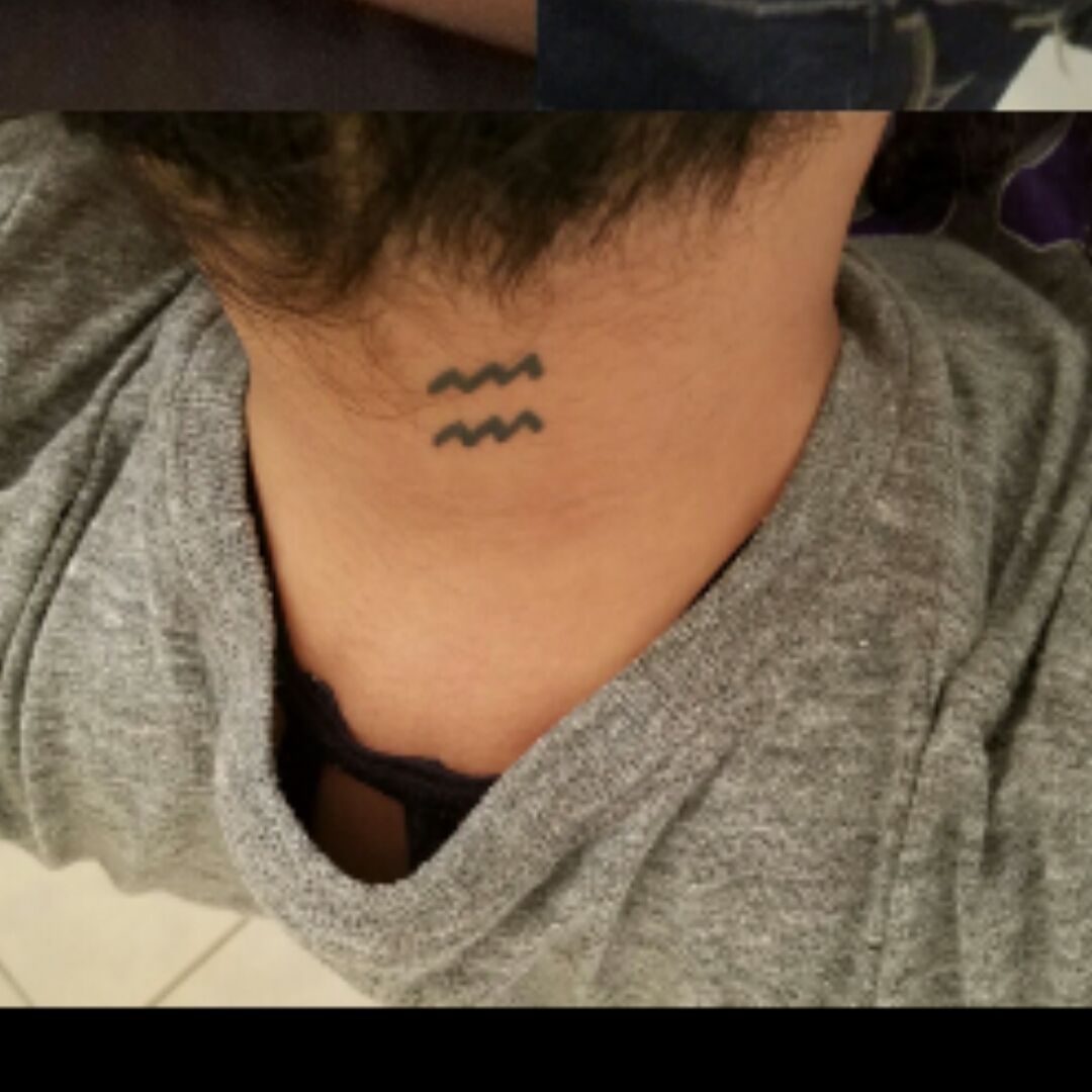 aquarius tattoo on neck