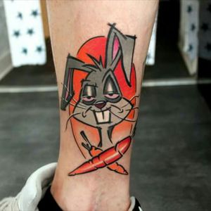 Clean and funny Bugs Bunny by Mariusz Kaczmarek. #tattoo #legtattoo #funnytattoos #bugsbunny #colortattoo #cartoon #mariuszkaczmarek