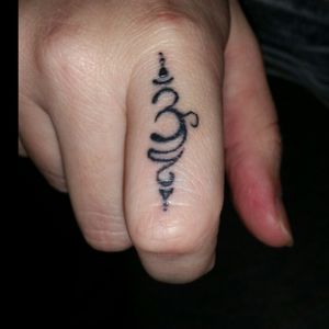 My favorite tattoo it's an unalome with the om symbol incorporated