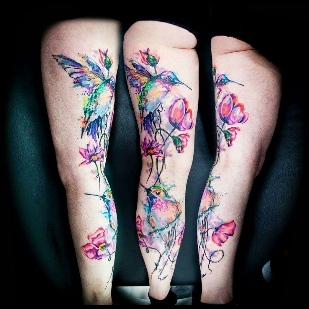 Watercolor thigh tattoos for women