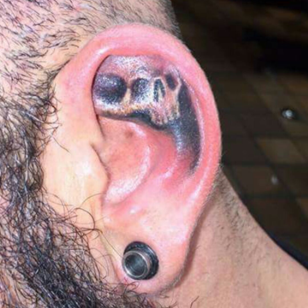 Man with Behindtheear Skull Tattoo  Behind ear tattoos Behind ear tattoo  Neck tattoo