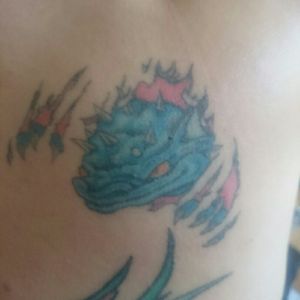 Baby dragon ripping out of skin