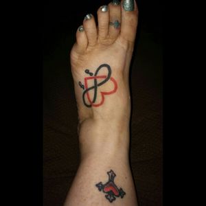 Friendship toe ring that 5 of us have. Best friend of 25 years and I have foot tattoo. Cross is part of family cancer leg.