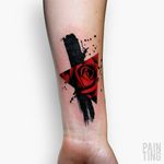 Interesting black steak of paint with a red rose inside a triangle tattoo #dreamtattoo #mydreamtattoo