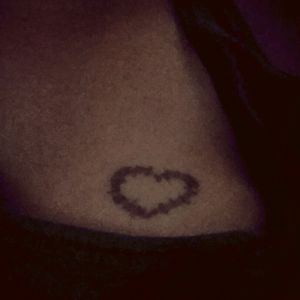 My 1st Tattoo heart made out of barbed wire meaning "my love is my pain"