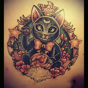 Moon, crystal, and the banner around luna still needs to be colored. As well as the broach luna is holding. Oh and her eyes. So far it's beautiful. Ashley Primm from #studioink is a badass. #luna #maneki #SailorMoon