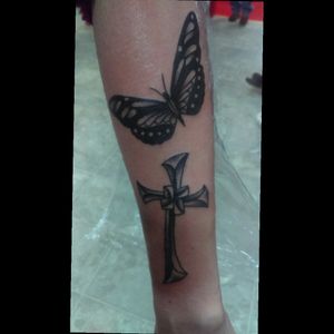 Cross and butterfly represent new beginning. Working on sleeve since my accident last September that left me with 25% survival rate..