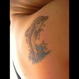 My tattoo. The dolphin is my favourite animal and I love the ocean. I am blessed to live in the Atlantic coast.