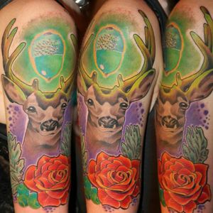 One of my first tattoos! Time flies by. I wish i still liked it as much now as i did then..#deer #animal #antlers #newschool #colourful #rose #neon