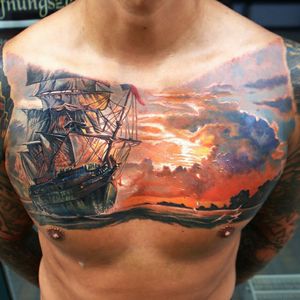 My next dream tattoo, is something like this. I love the colours of the sunset and details of the ship. #dreamtattooo @amijames