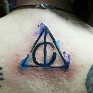 Deathly hallows by @agny #watercolor #tattoo #harrypotter #fans #fantasy #purple #blue #colorsplash