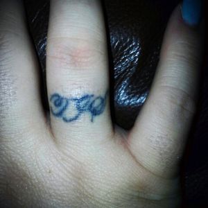Need this covered up.... Those initials are NOT my husbands, and I was a little tipsy when I got this. Guy who gave me this thought it would be funny to put his, instead of what I originally wanted.