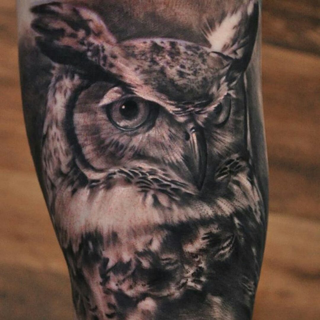50 of the Most Beautiful Owl Tattoo Designs and Their Meaning for the  Nocturnal Animal in You  KickAss Things  Owl tattoo design Owl tattoo  Feather tattoo black