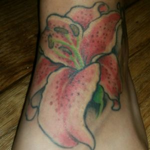 My Mother's day tattoo. ....Star Gazer Lilly.......my favorite flowers  <3#stargazerlily #nursetattooed #tupaclove #progress #love #pain #Texas #nofillterneeded #InkForGood #tattooedforlife
