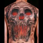 Sick full back black & grey & red realistic large skull tattoo, moth opening into fire with filigree tattoo