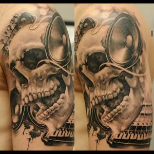 Awesome hyper realistic skull with music speakers, guitar had, piano tattoo#dreamtattoo #mydreamtattoo
