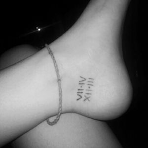 I had a cat from 2 years old to 16 years old. This is her birthday and death date. Her name was Martha. #firsttattoo #romannumerals #ankle #stickandpoke