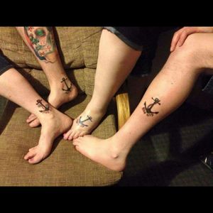 Family anchor tattoos. I'm the one with the day of the dead tattoo.
