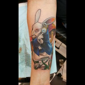 Alice in wonderland rabbit tattoo. Done by Jason Tackett.