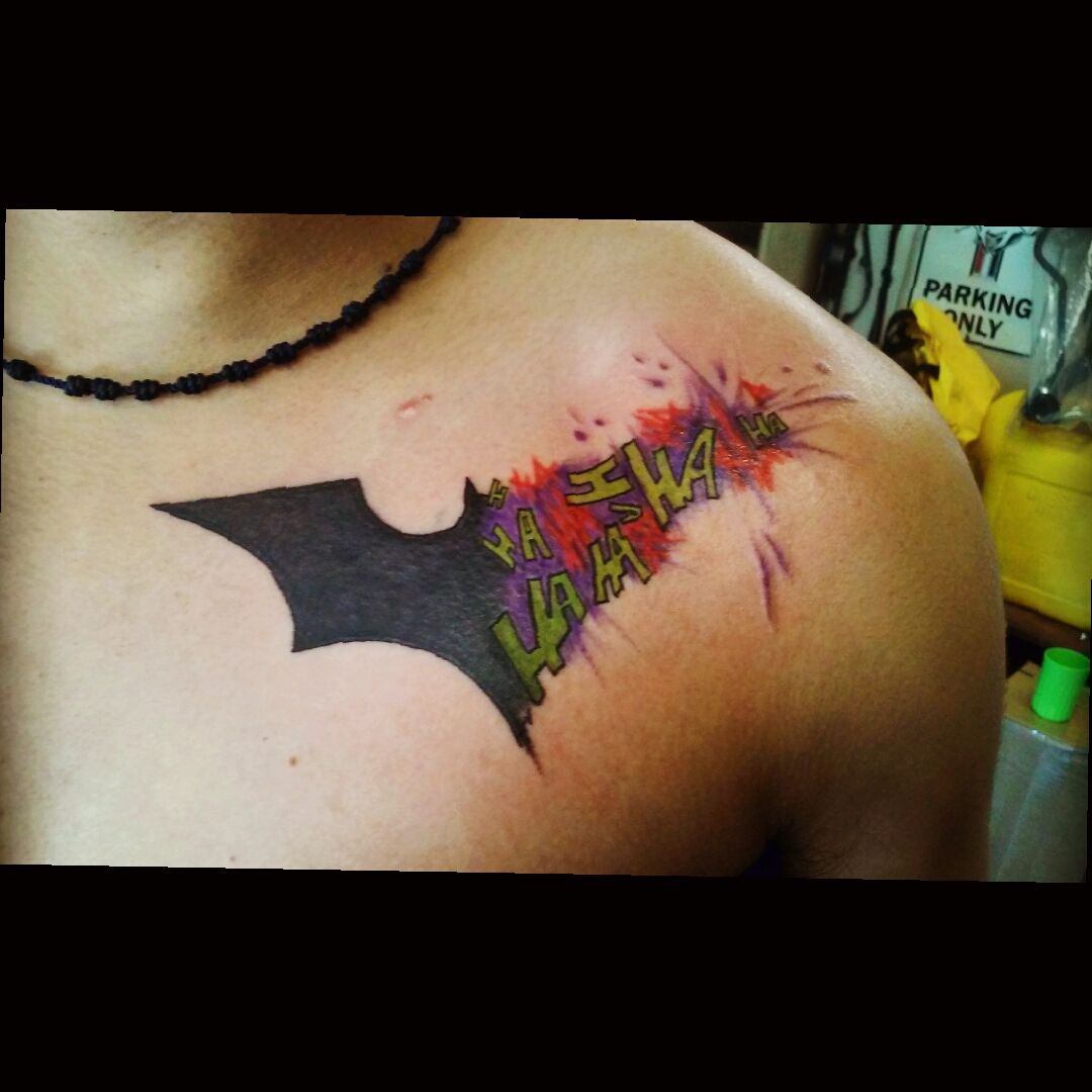 batman logo tattoo chest