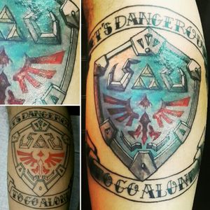 #HylianShield "It's Dangerous To Go Alone" My brother's 2nd tattoo and my favorite work so far!! lml #tattoo #customtattoo #legtattoo #linework #shading #coloring #lettering #geektattoo #videogametattoo #gamertattoo #gamerink #hyruleshield #zeldatattoo #thelegendofzeldatattoo #thelegendofzelda #ilustrativetattoo #CostaRicaTattoo #AndrésPeñaTattoos