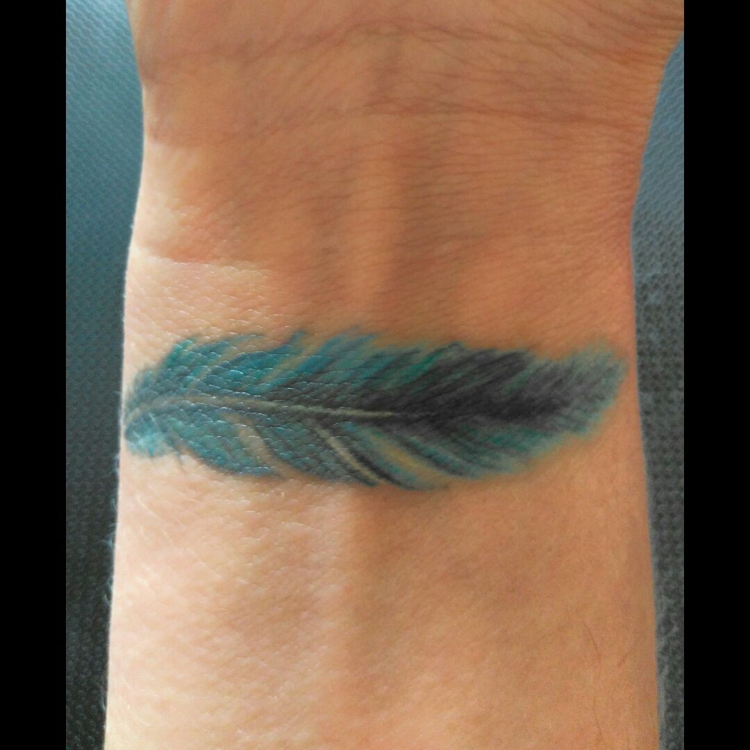 Tattoo Uploaded By Claire Feather Wristtattoo Tattoodo